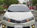 Sell Pearl White 2014 Toyota Corolla Altis -6