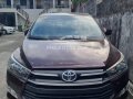 2020 Innova E AT 17k odo blackish Red dao6023 - 928k-0