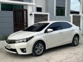 Pearl White Toyota Corolla Altis 2014 for sale in Calasiao-5