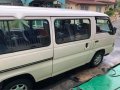 Selling Pearl White Nissan Urvan 2009 in San Pedro-1