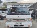Selling White Mitsubishi L300 2016 in Quezon -0