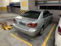 Selling Brightsilver Toyota Corolla Altis 2005 in Manila-2