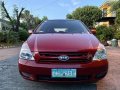 Red Kia Carnival 2.5 (A) 2009-8