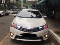 Selling Pearl White Toyota Corolla Altis 2015 in Bulacan-1