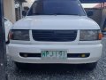 Selling Pearl White Toyota Revo 1999 in Balagtas-1