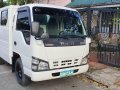 Sell Pearl White 2013 Isuzu Nhr in Quezon City-0