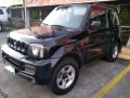 Selling Black Suzuki Jimny 2011 in Makati -0