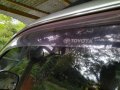 Selling Brightsilver Toyota Revo 2004 in Digos-1