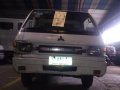 Selling White Mitsubishi L300 2012 in Quezon City-8