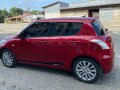 Red Suzuki Swift 2013 for sale in Lupao-2