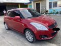 Red Suzuki Swift 2013 for sale in Lupao-1