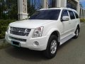 Selling White Isuzu Alterra 2010 in Cebu -1