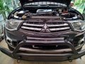 Selling Black Mitsubishi Strada 2014 in Gapan-0