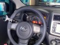 Selling White Toyota Wigo 2016 in Quezon City-1