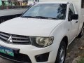 Sell White 2013 Mitsubishi L200 in Quezon City-8