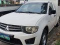 Sell White 2013 Mitsubishi L200 in Quezon City-1