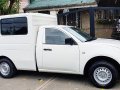 Sell White 2013 Mitsubishi L200 in Quezon City-3