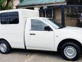 Sell White 2013 Mitsubishi L200 in Quezon City-6