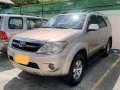Pearl White Toyota Fortuner 2006 for sale in Balete -7