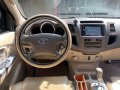 Pearl White Toyota Fortuner 2006 for sale in Balete -2