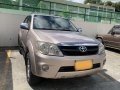 Pearl White Toyota Fortuner 2006 for sale in Balete -6