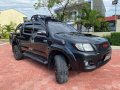 Black Toyota Hilux 2013 for sale in Quezon -8