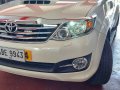 Pearl White Toyota Fortuner 2014 for sale in Lucena-9
