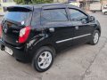 Black Toyota Wigo 2014 for sale in Manual-7