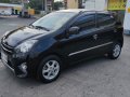 Black Toyota Wigo 2014 for sale in Manual-4