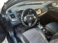 Black Mitsubishi Lancer 2010 for sale in Automatic-0