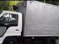 Selling White Isuzu Elf 2003 in Parañaque-8