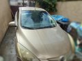 Pearl White Mazda 2 2010 for sale in Caloocan -5