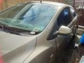 Pearl White Mazda 2 2010 for sale in Caloocan -4