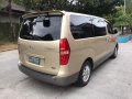 Selling Golden Hyundai Starex 2009 in Quezon-8