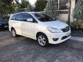 Selling Pearl White Toyota Innova 2012 in Quezon-6