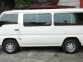 Pearl White Nissan Urvan 2013 for sale in Makati -6