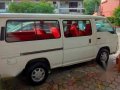 Pearl White Nissan Urvan 2013 for sale in Makati -4