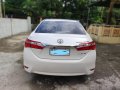 Selling Pearl White Toyota Corolla altis 2015 in Alfonso-6