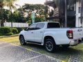 Pearl White Mitsubishi Strada 2019 for sale in Quezon -1