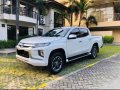 Pearl White Mitsubishi Strada 2019 for sale in Quezon -4