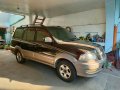 Selling Brown Toyota Revo 2003 in Quezon -0