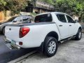 Selling White Mitsubishi Strada 2011 in Quezon City-5