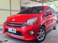Selling Red Toyota Wigo 2016 in Quezon City-0