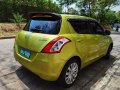 Yellow Suzuki Swift 2012 for sale in Pateros -5