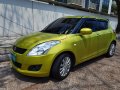 Yellow Suzuki Swift 2012 for sale in Pateros -3