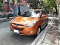 Orange Hyundai Tucson 2014 for sale in Automatic-8