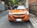 Orange Hyundai Tucson 2014 for sale in Automatic-9