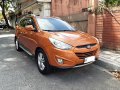 Orange Hyundai Tucson 2014 for sale in Automatic-7