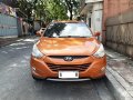 Orange Hyundai Tucson 2014 for sale in Automatic-6