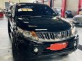 Selling Black Mitsubishi Strada 2015 in Los Baños-4